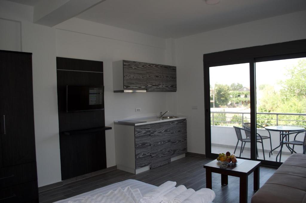Kuchyň nebo kuchyňský kout v ubytování Flo Apartments
