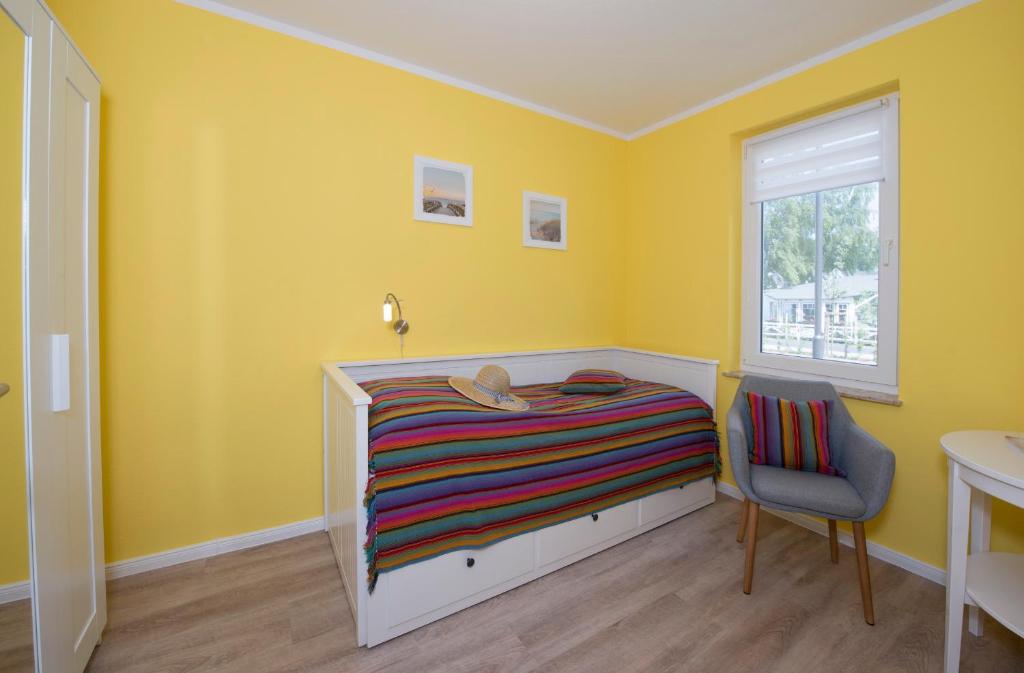 Postel nebo postele na pokoji v ubytování Ferienhaus Küstensegler