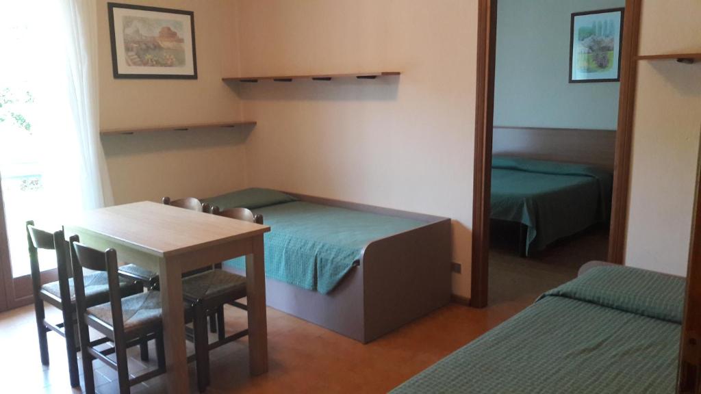 Voodi või voodid majutusasutuse Hotel Residence Moneglia toas