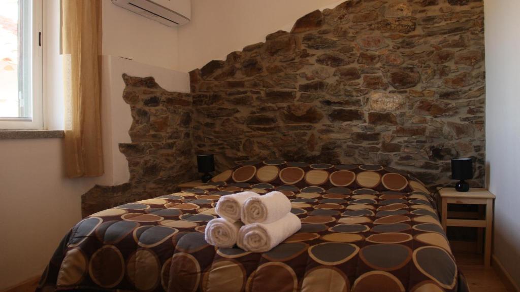 Postel nebo postele na pokoji v ubytování Casas dos Carregais