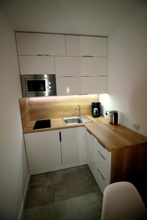 Kuchyňa alebo kuchynka v ubytovaní Apartamenty Podgorze