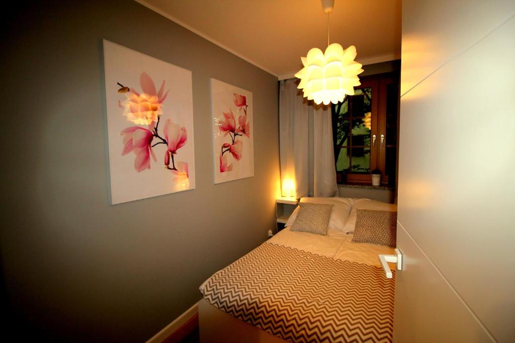 Posteľ alebo postele v izbe v ubytovaní Apartamenty Podgorze