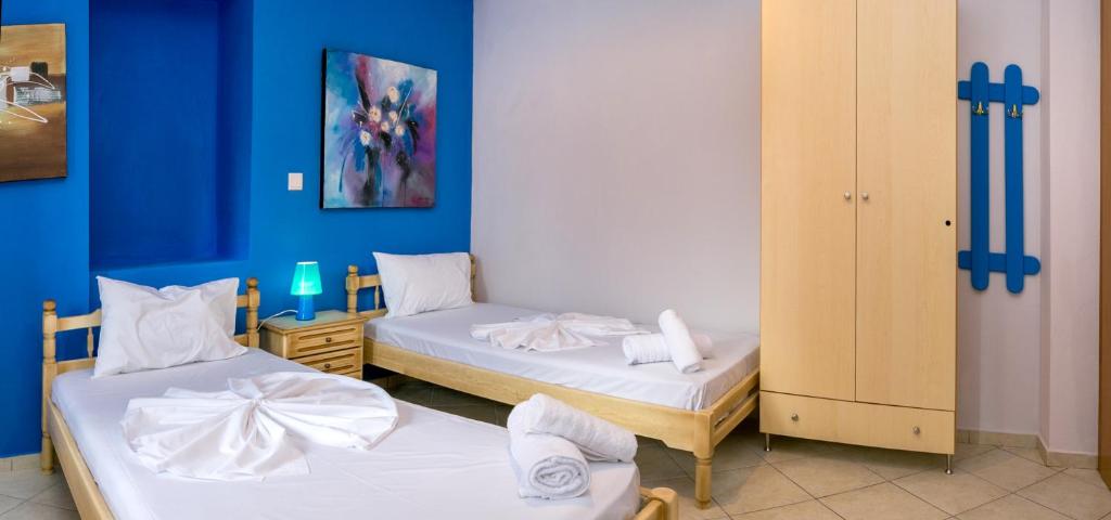 Postel nebo postele na pokoji v ubytování Grande Apartments