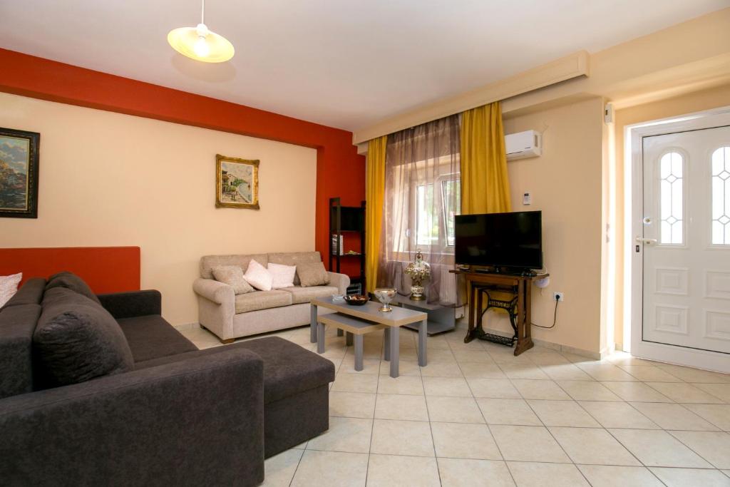 TV a/nebo společenská místnost v ubytování Grande Apartments