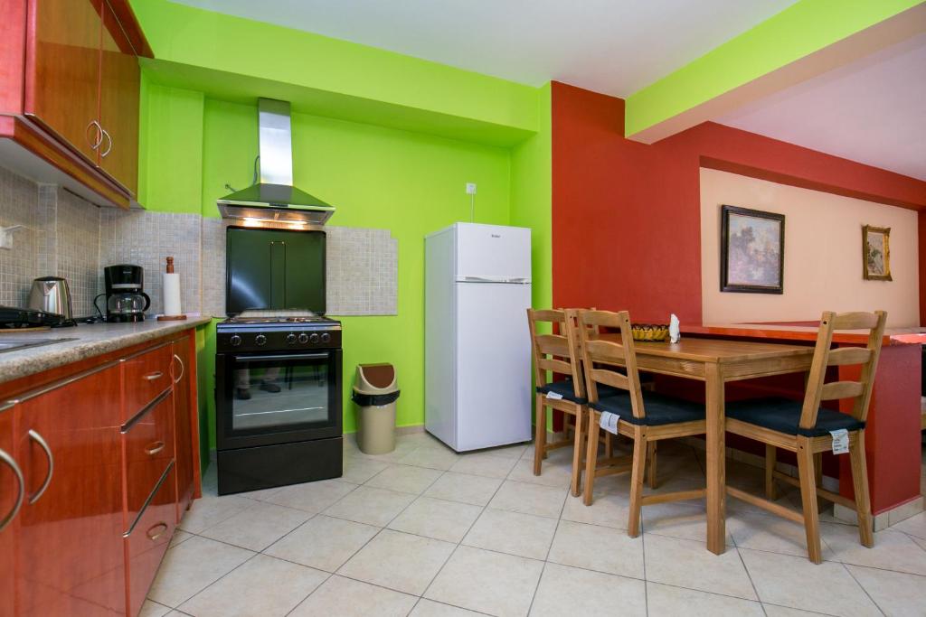 Kuchyň nebo kuchyňský kout v ubytování Grande Apartments