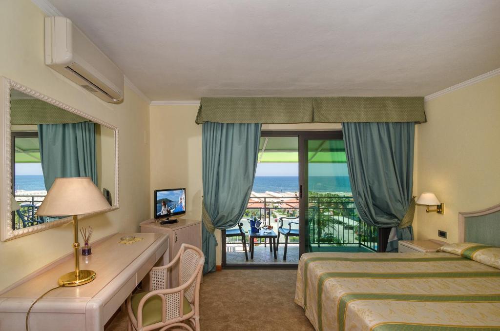 TV a/nebo společenská místnost v ubytování Hotel Siesta