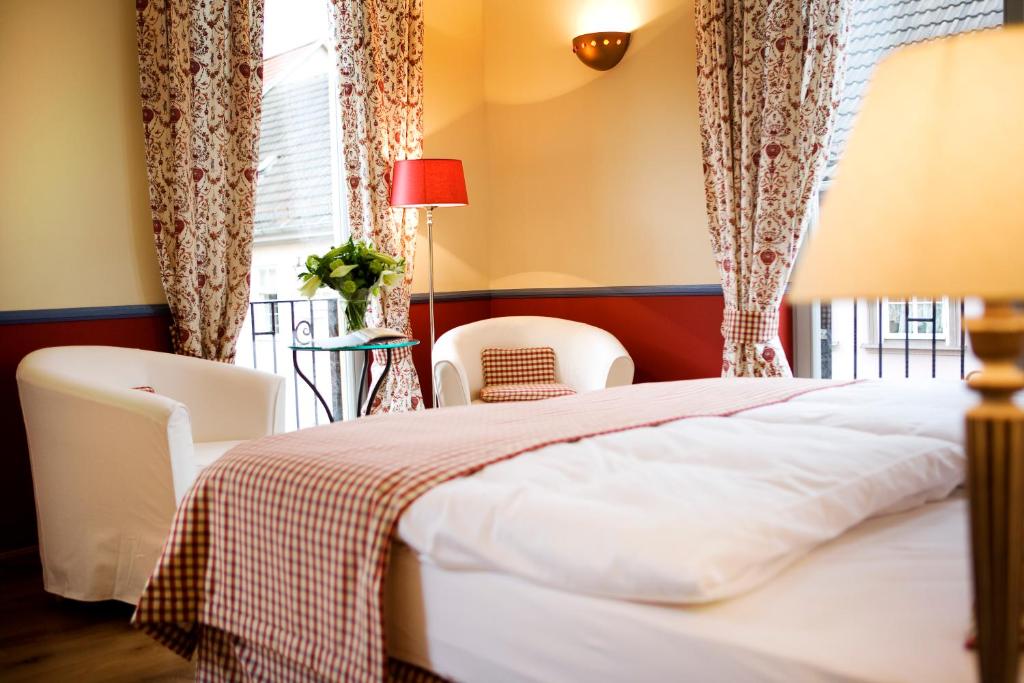 A bed or beds in a room at Pension La Casa dei Colori