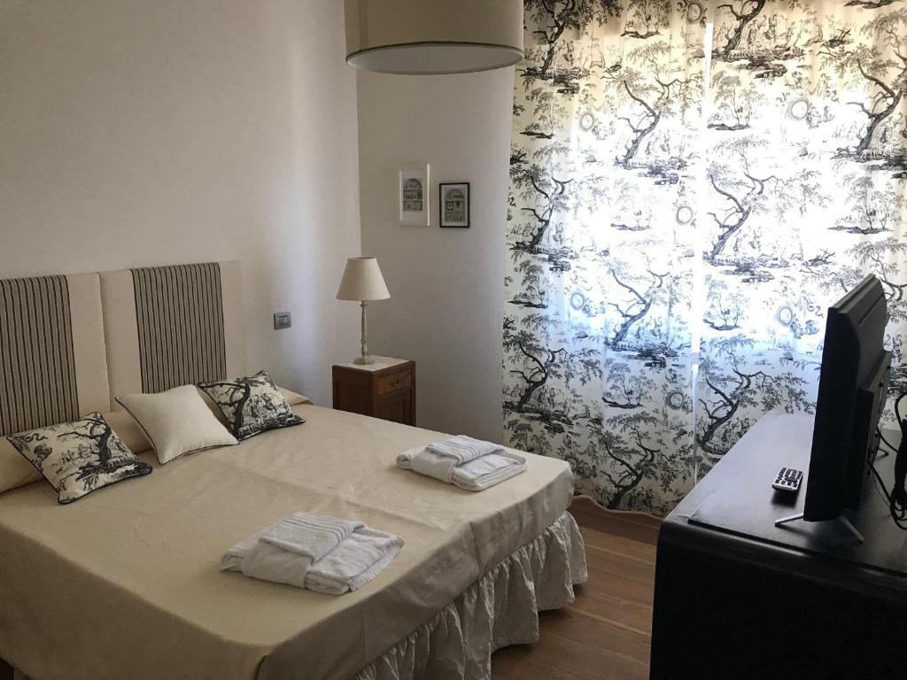 Posteľ alebo postele v izbe v ubytovaní Agriturismo Villa Le Vigne