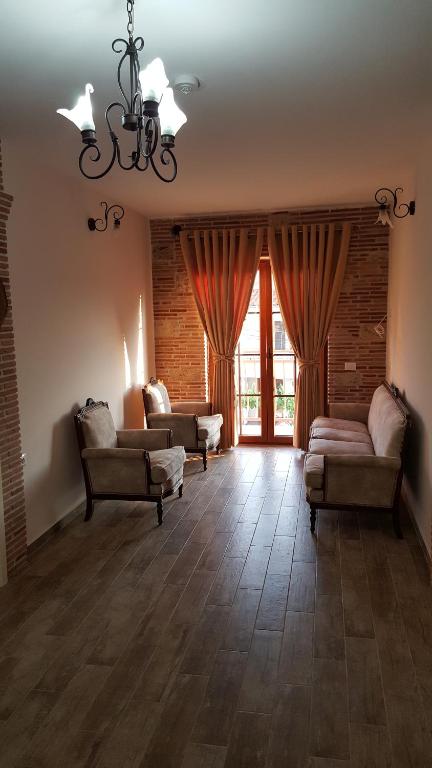 Posezení v ubytování Hotel Bujtina Ollga