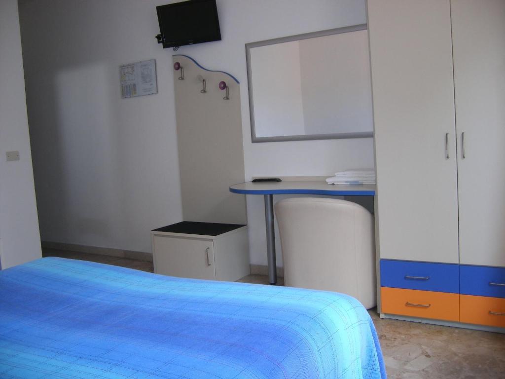 Postel nebo postele na pokoji v ubytování Hotel Belvedere