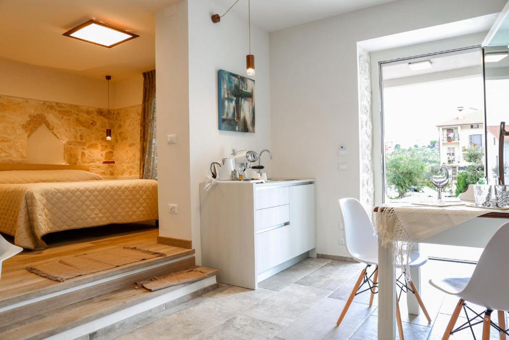 Postel nebo postele na pokoji v ubytování B&B Dei Raselli