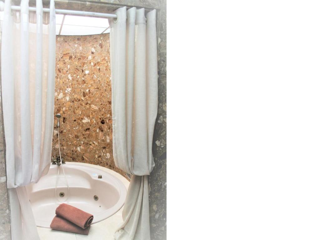 A bathroom at Bungalow Mariano 140