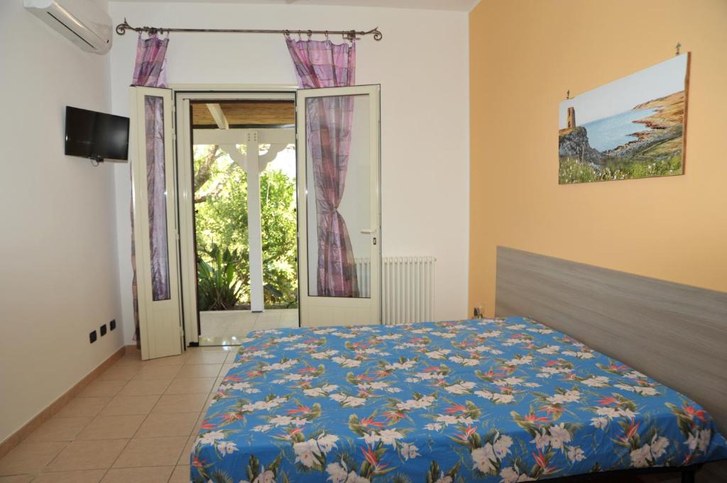Postel nebo postele na pokoji v ubytování Vacanze al Minci