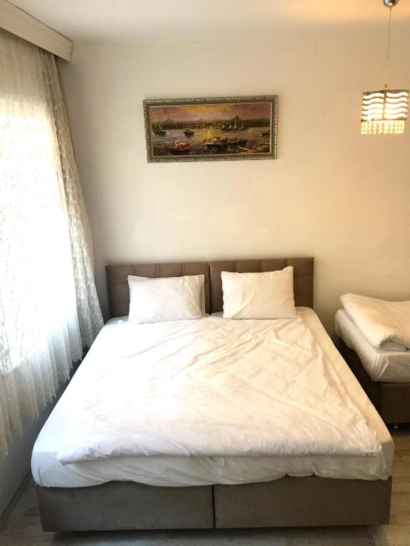 Postel nebo postele na pokoji v ubytování Oldtown Sultanahmet Suites