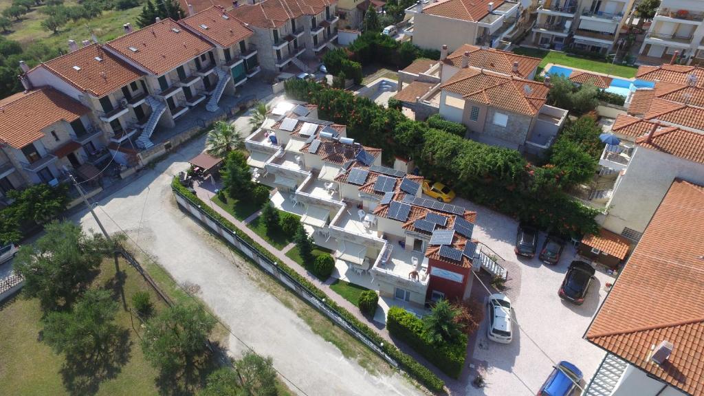 an overhead view of a city with houses and a street at Apartments Monika in Kriopigi