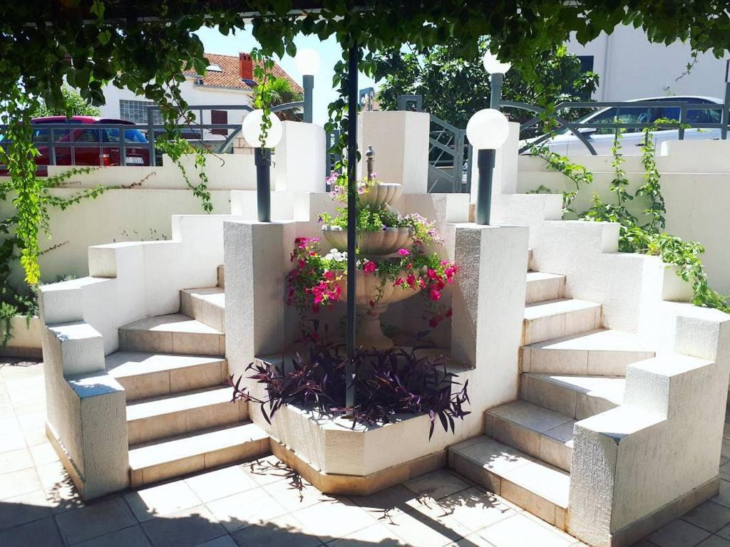 Vonkajšia záhrada v ubytovaní Laganini Apartments