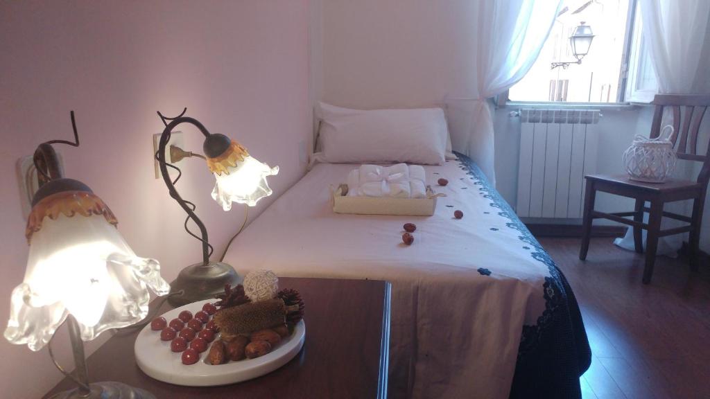 Llit o llits en una habitació de Dreaming Navona Rooms