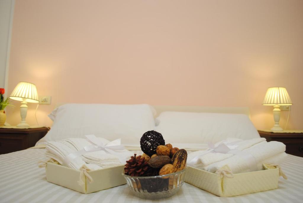 Llit o llits en una habitació de Dreaming Navona Rooms