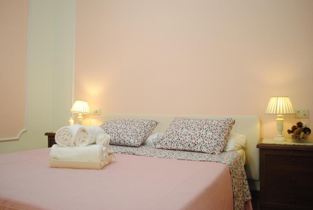 Llit o llits en una habitació de Dreaming Navona Rooms