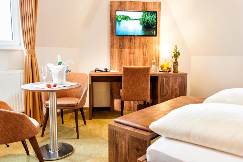 TV a/nebo společenská místnost v ubytování Hotel Hilker