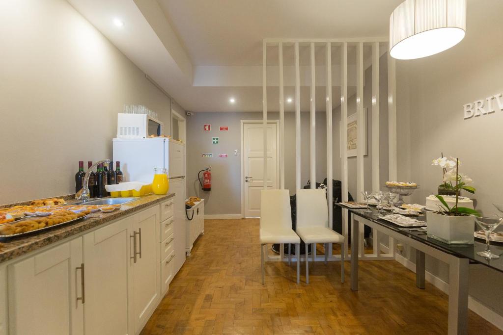 Kuchyň nebo kuchyňský kout v ubytování Brivaldo Guest House