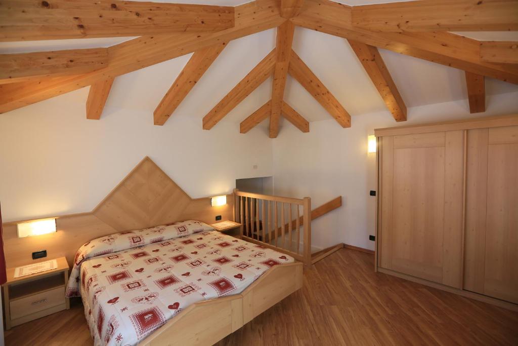 Postel nebo postele na pokoji v ubytování Hotel Miramonti