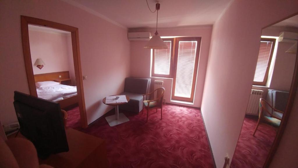 Postel nebo postele na pokoji v ubytování Hotel Delminium