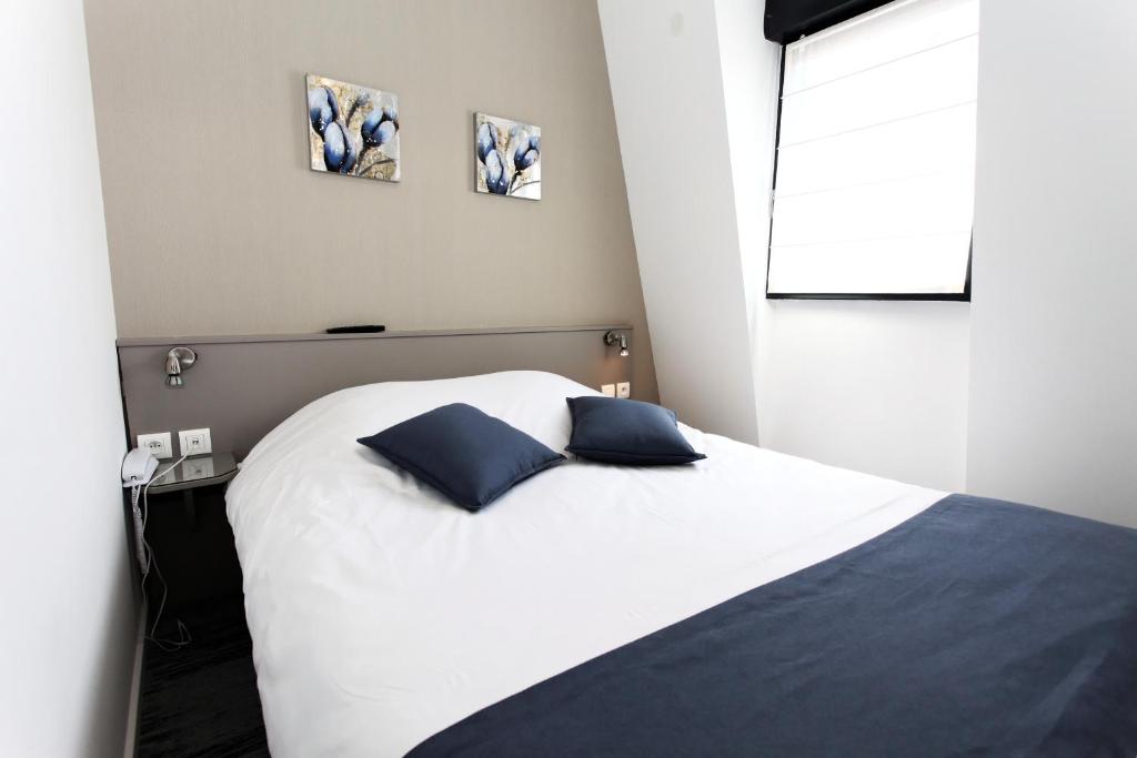 Postel nebo postele na pokoji v ubytování Hôtel De L'Ill