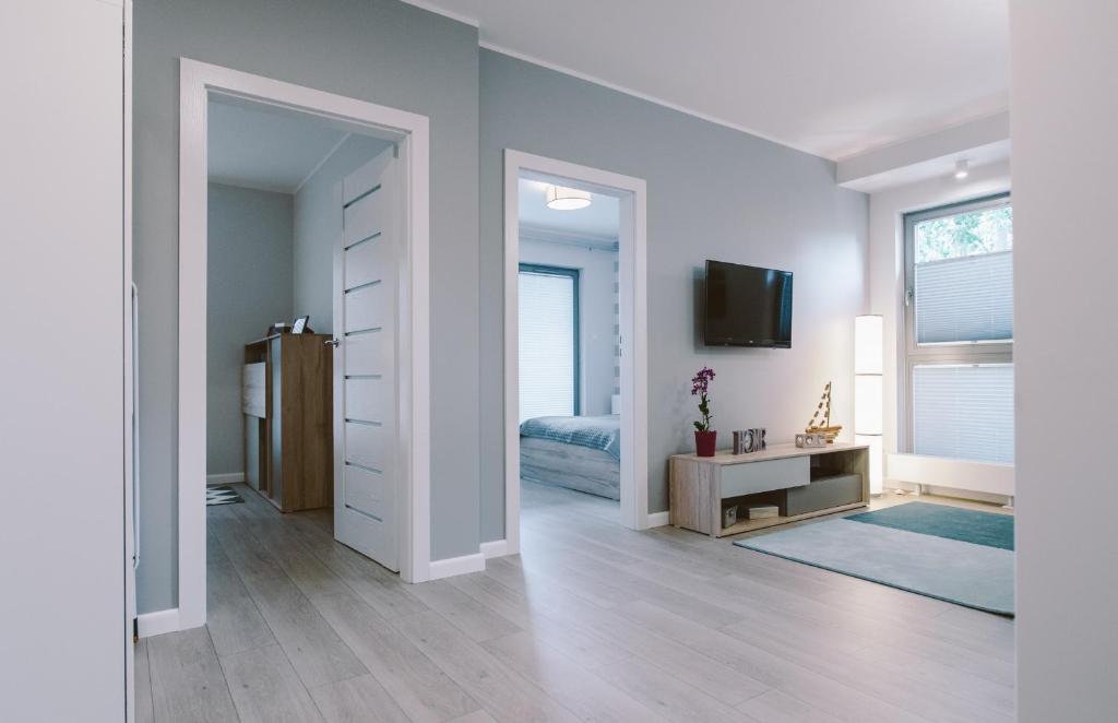 Posteľ alebo postele v izbe v ubytovaní Apartamenty Rodzina nad morzem