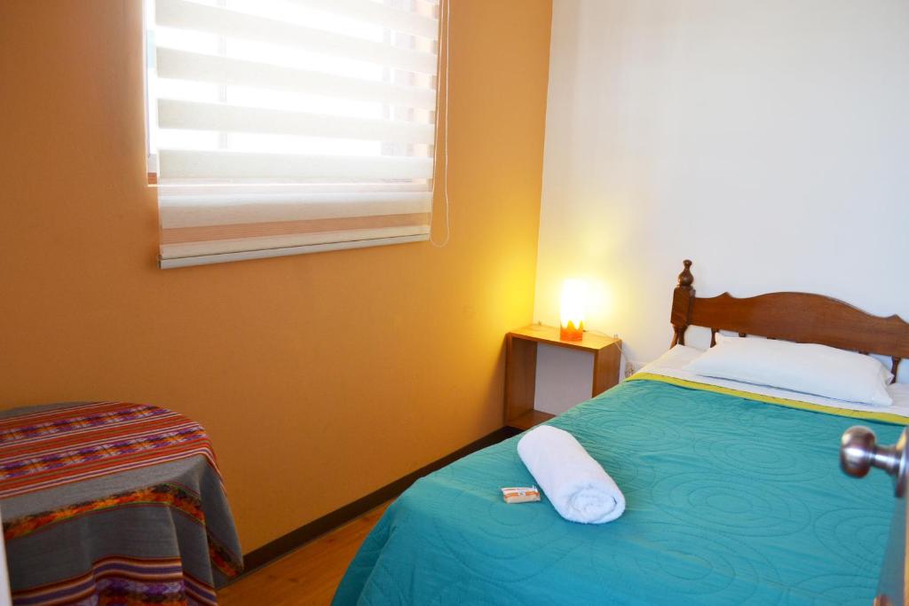 Postel nebo postele na pokoji v ubytování Casa Rodas
