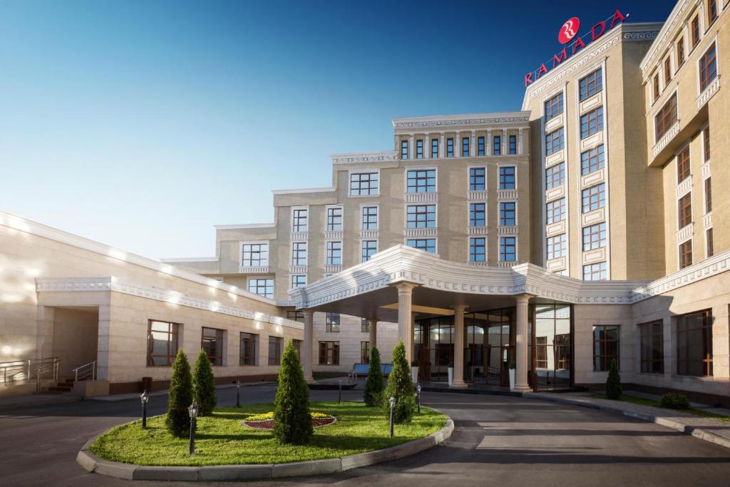 una representación de la parte delantera de un hotel en Ramada by Wyndham Almaty en Almaty
