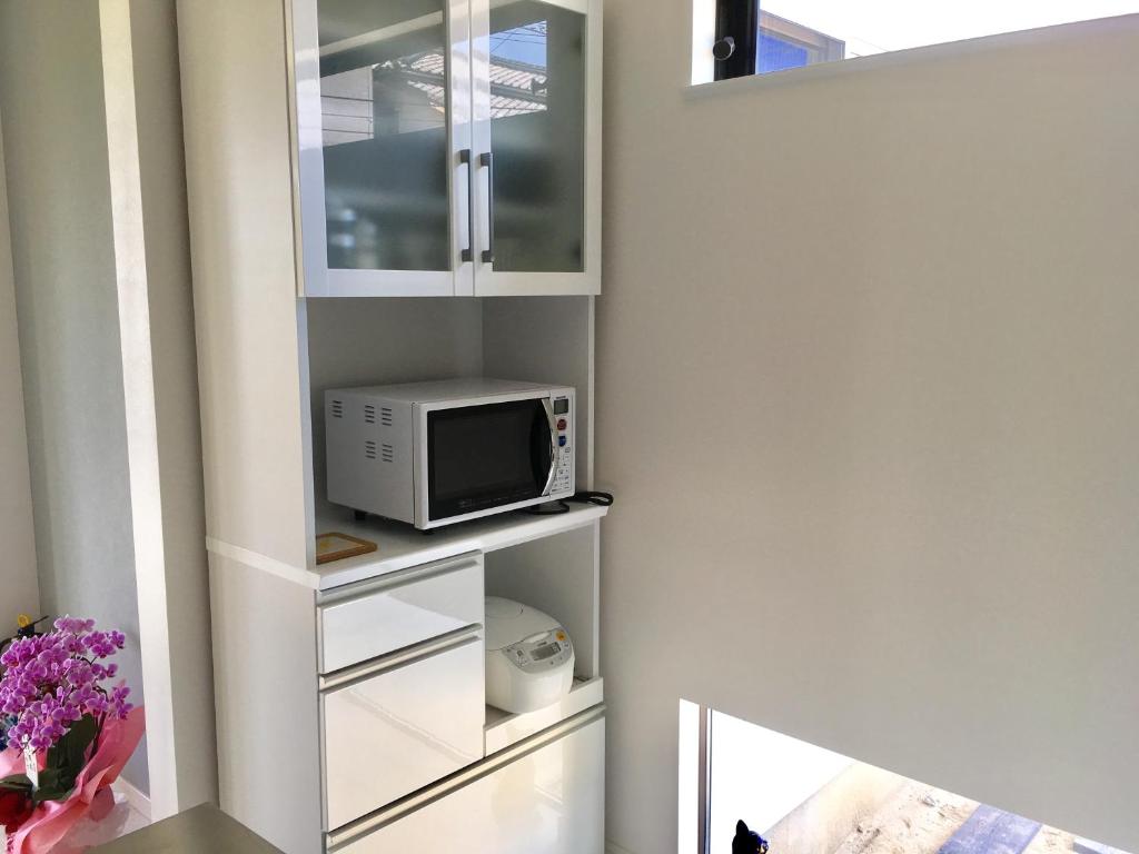 Kuchyň nebo kuchyňský kout v ubytování Guesthouse ORI ORI