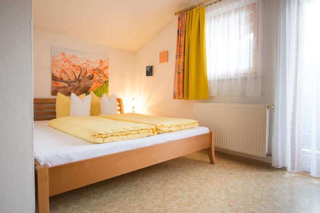 Posteľ alebo postele v izbe v ubytovaní Apart-Pension Wasserfall
