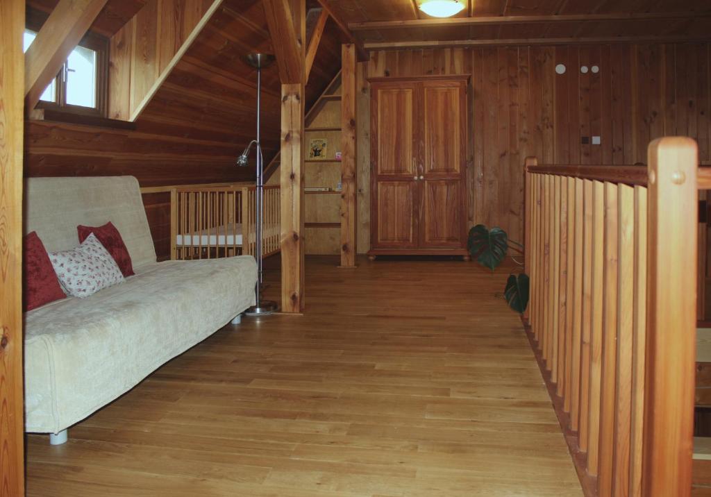 Postel nebo postele na pokoji v ubytování Apartmán ve Skanzenu
