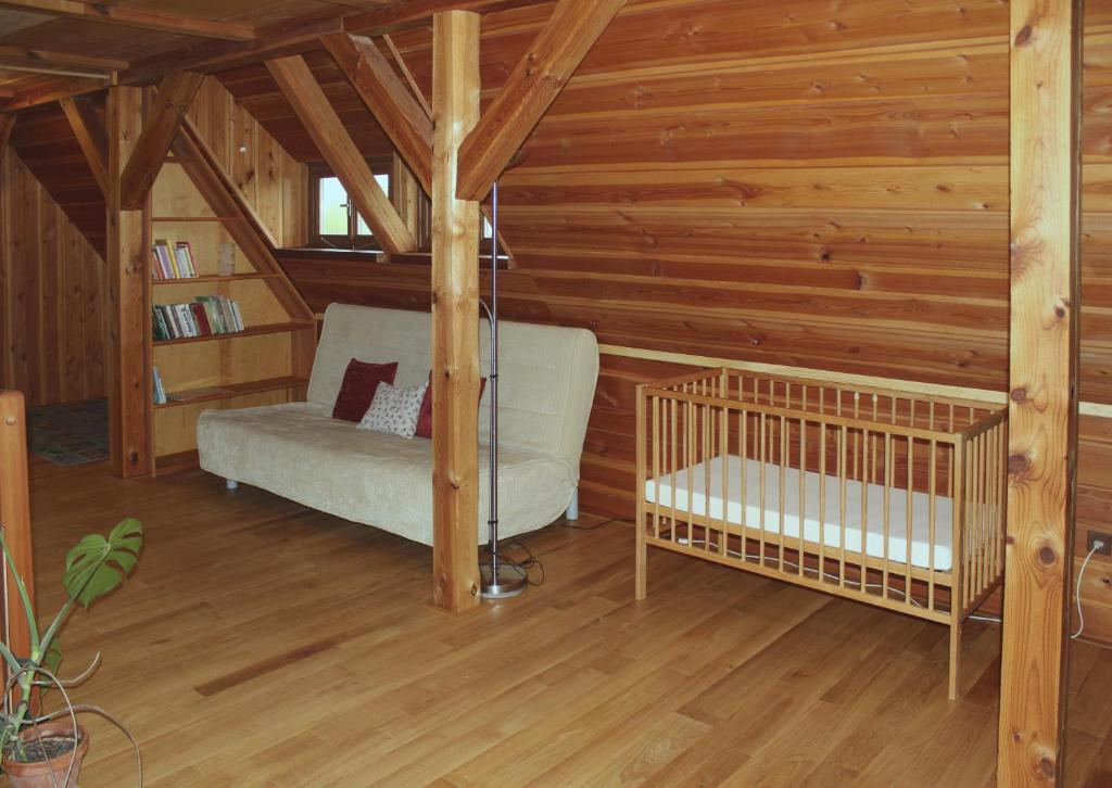 Postel nebo postele na pokoji v ubytování Apartmán ve Skanzenu