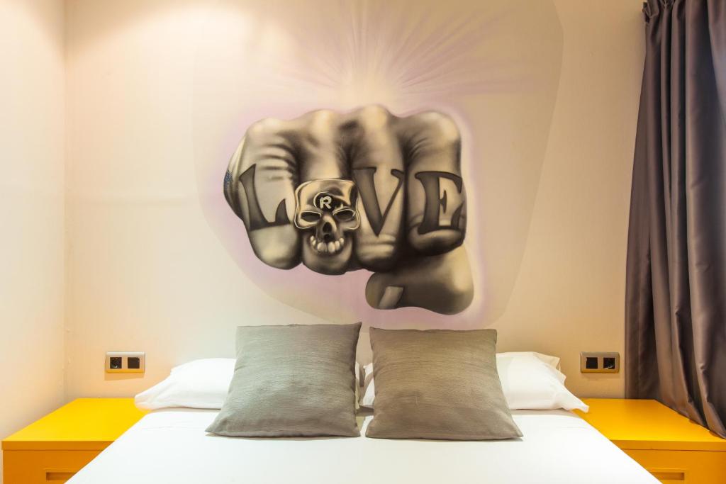 Postel nebo postele na pokoji v ubytování Ten Hostel