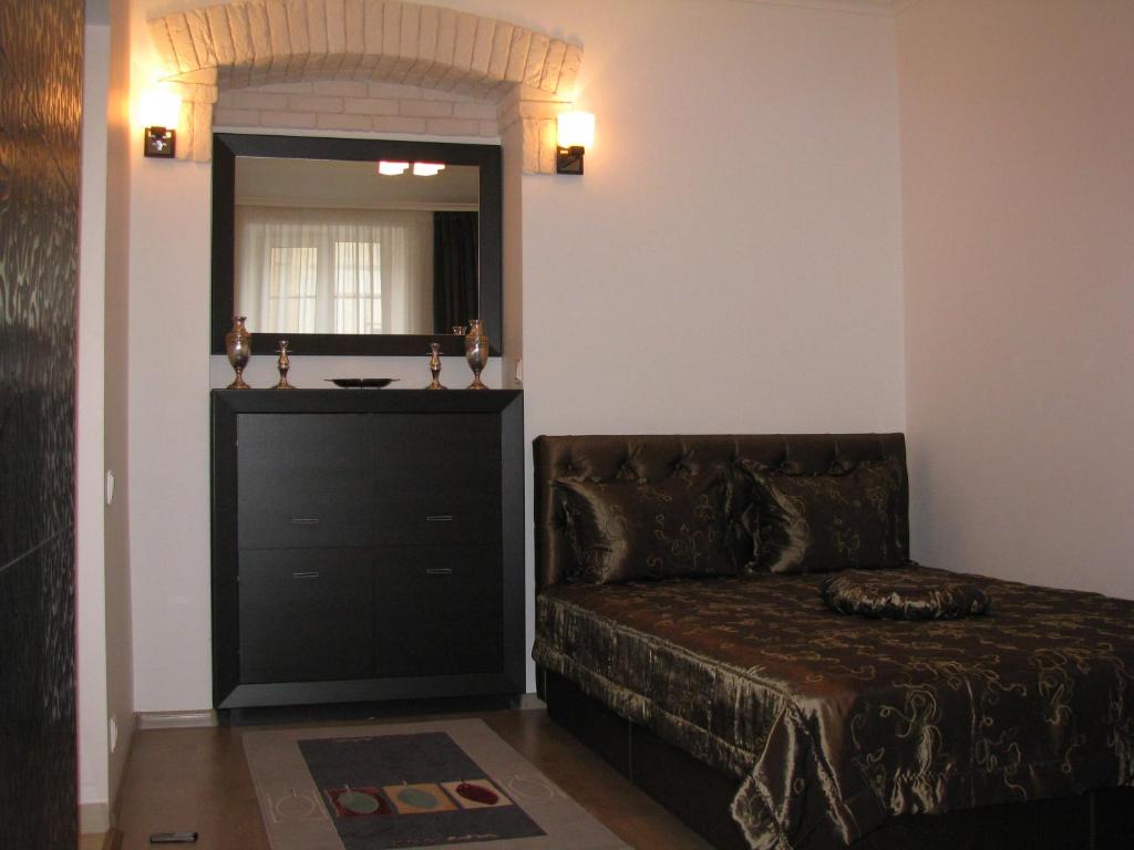 Lova arba lovos apgyvendinimo įstaigoje Apartment on Staroievreiska