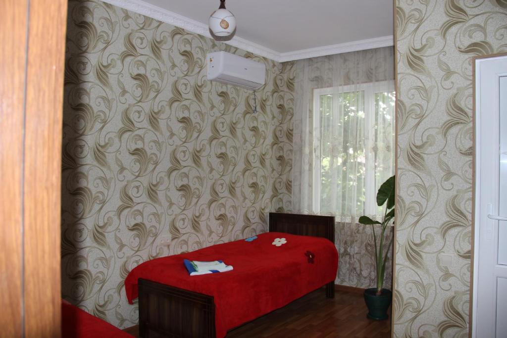 Postel nebo postele na pokoji v ubytování Hotel Oniks