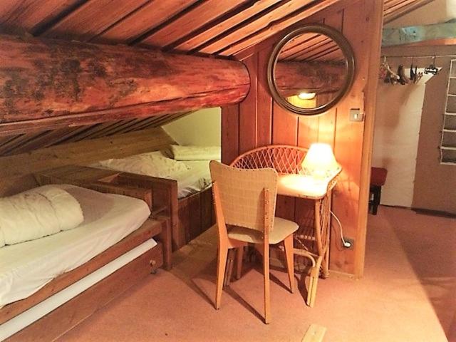 Postel nebo postele na pokoji v ubytování Chalet Le Ranch