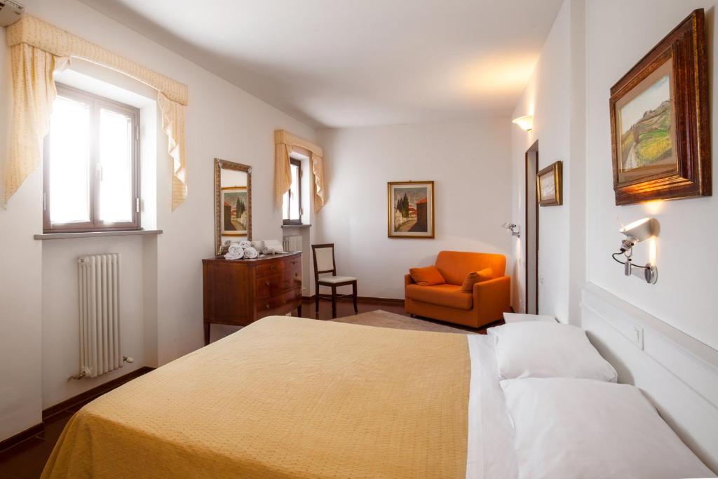 Postel nebo postele na pokoji v ubytování Hotel Porta Romana di Luce Hotels