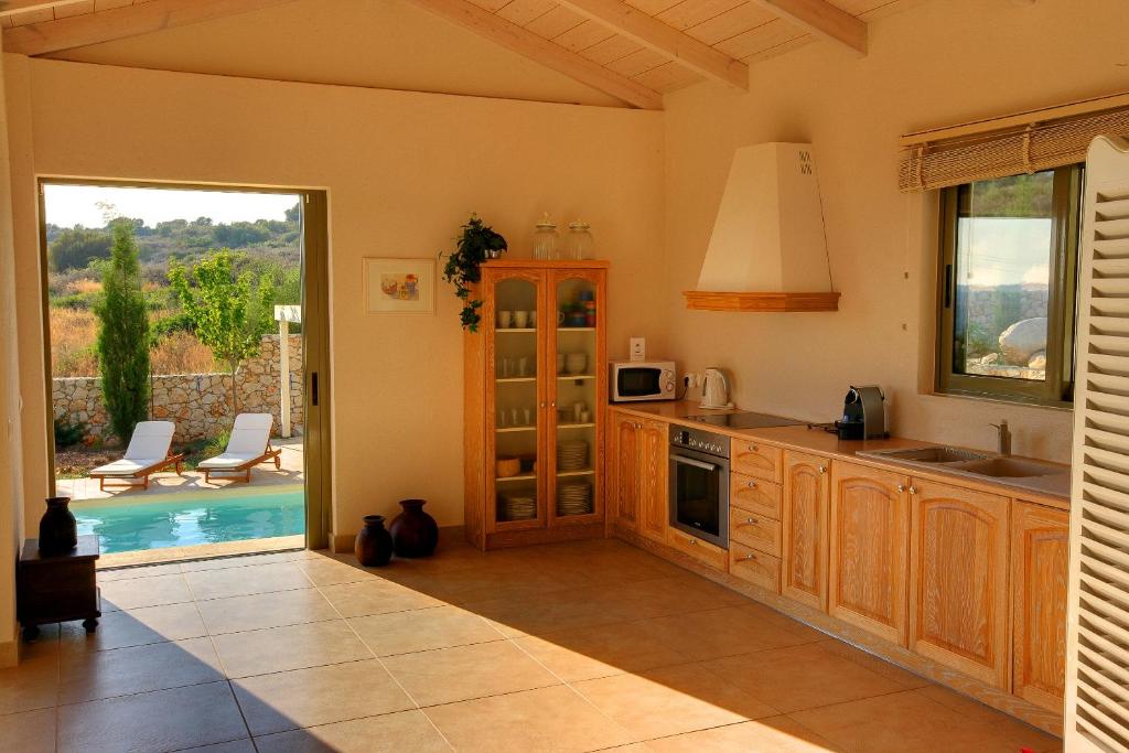 Kuchyň nebo kuchyňský kout v ubytování Ideales Resort