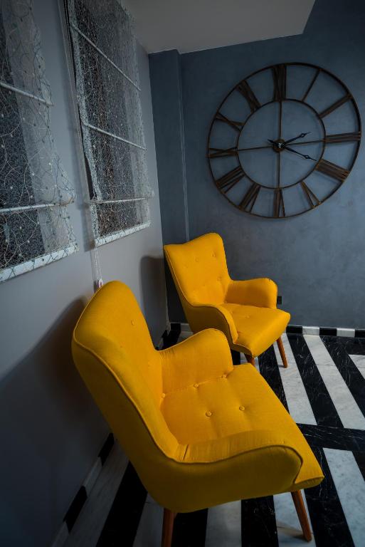 Posezení v ubytování Peninsula Boutique Hotel