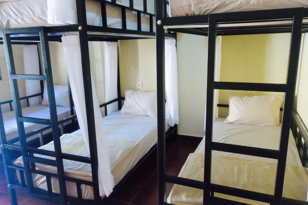 Postel nebo postele na pokoji v ubytování Inn Between