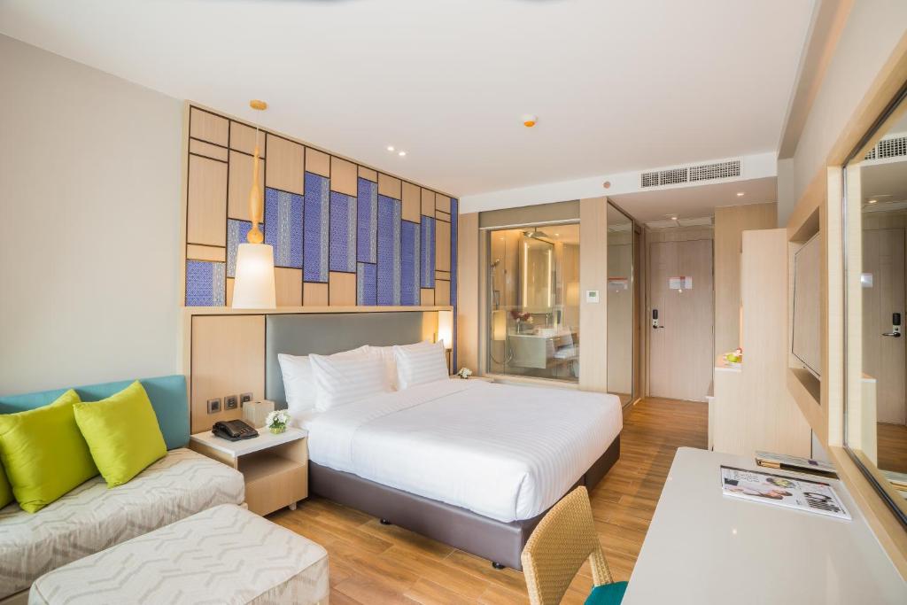 Postel nebo postele na pokoji v ubytování Avani+ Hua Hin Resort