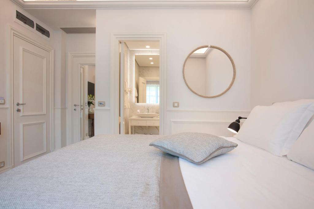 Posteľ alebo postele v izbe v ubytovaní Hotel Majestic