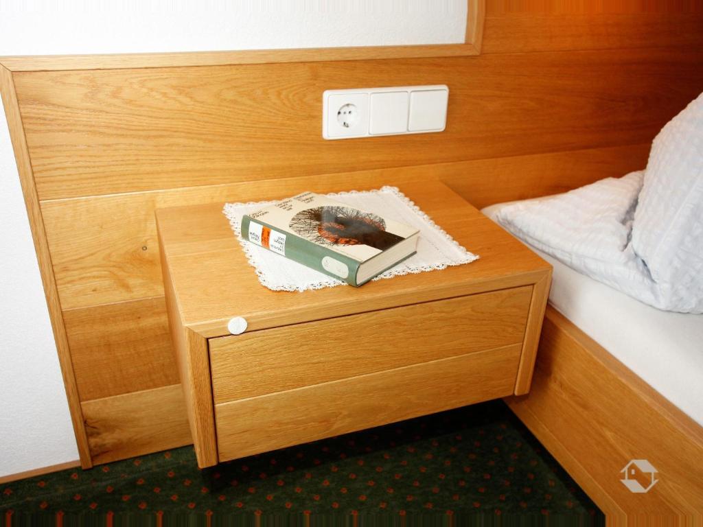 Postel nebo postele na pokoji v ubytování Gästehaus Wissler