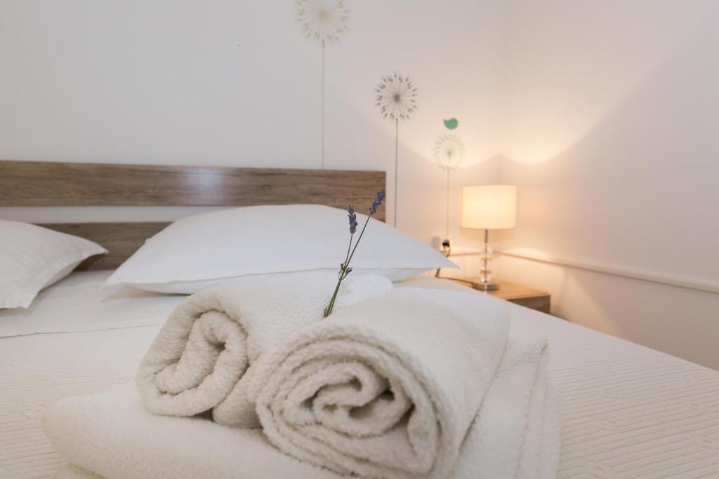 Posteľ alebo postele v izbe v ubytovaní Cozy apartment Josipa