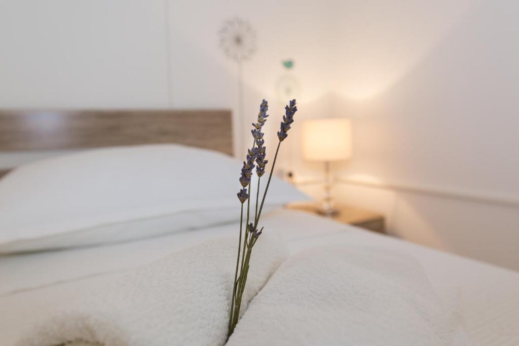Posteľ alebo postele v izbe v ubytovaní Cozy apartment Josipa
