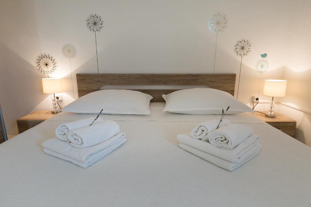 Posteľ alebo postele v izbe v ubytovaní Cozy apartment Josipa