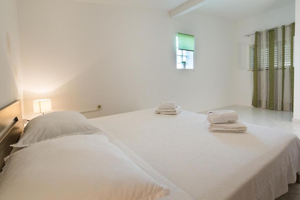Posteľ alebo postele v izbe v ubytovaní Cozy apartment Josipa